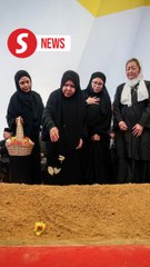 Pak Lah laid to rest after thousands pay their respects