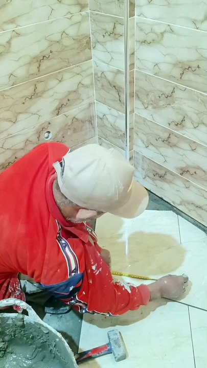 See how the bathroom floor tiles were installed with amazing precision! #tiles #ceramic