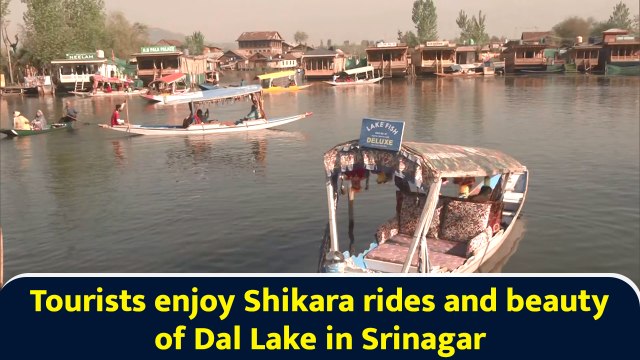 Tourists enjoy Shikara rides and beauty of Dal Lake in Srinagar