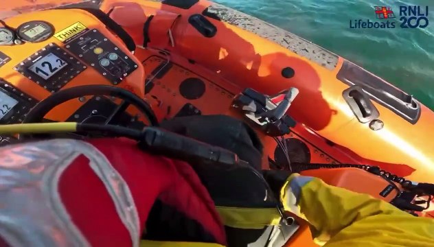 RNLI volunteers rescue two paddleboarders who were blown out to sea in Sussex