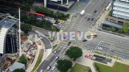 Singapore - Circa Aerial time lapse of a busy intersection in Singapore