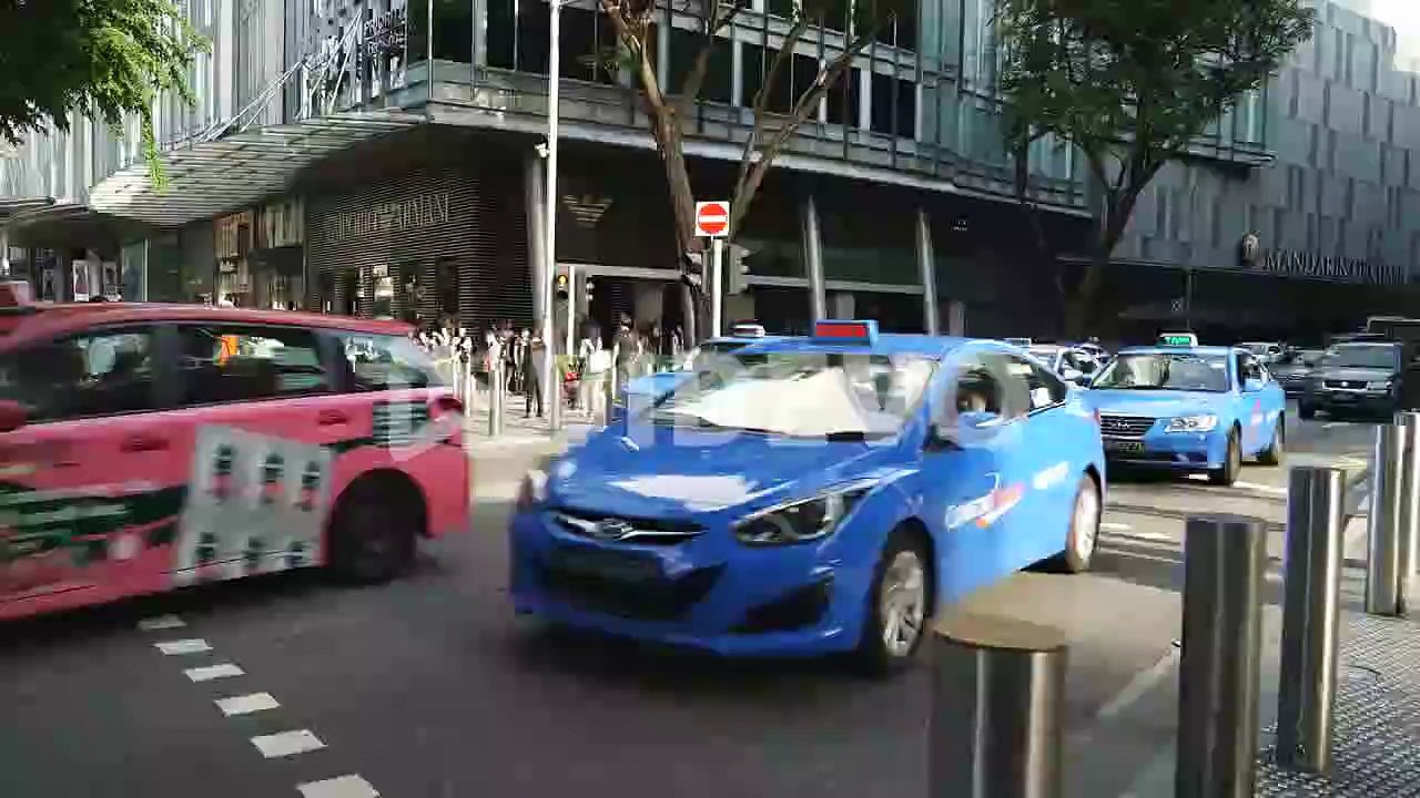 Singapore - Circa Time lapse of a crosswalk on a very busy Orchard Road in Singapore