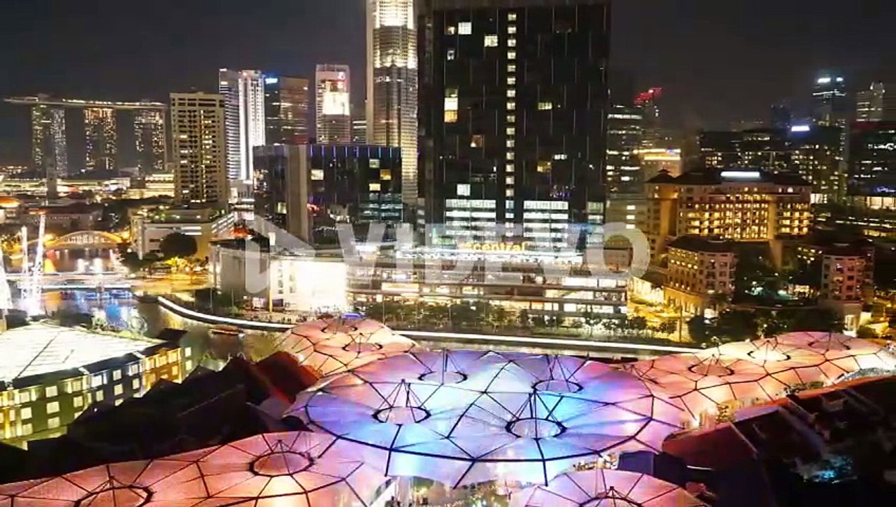 Boat quay in Singapore night dolly time lapse