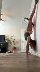 Clock Falls on Woman While She Attempts Handstand
