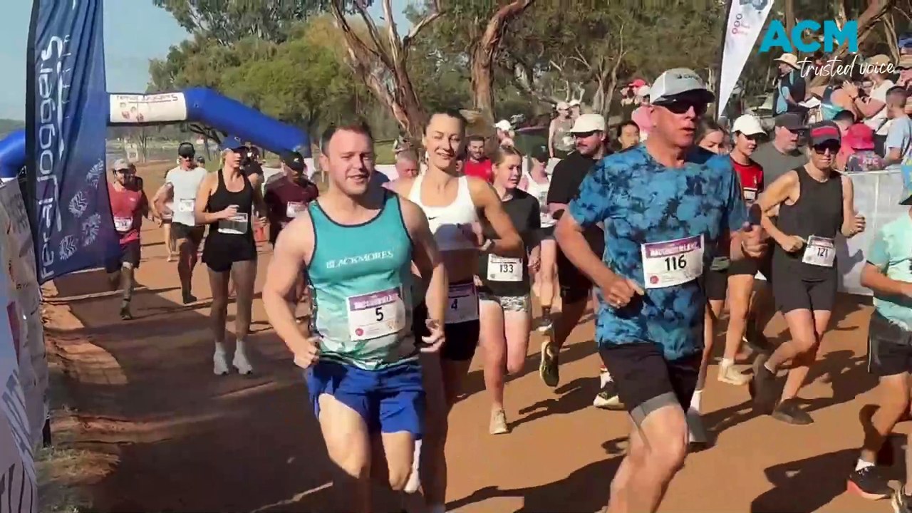 Joggers take to lake for 50th running of Bacchu...
