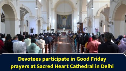 Devotees participate in Good Friday prayers at Sacred Heart Cathedral in Delhi