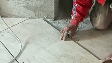 How to use a laser level to cut ceramic tiles with professional precision