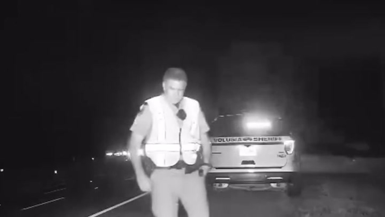 Heart-stopping moment out-of-control SUV almost crushes two highway patrol troopers