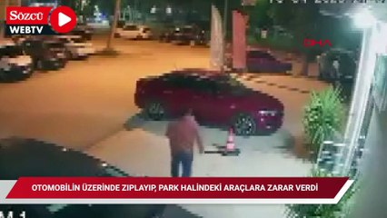 Otomobilin üzerinde zıplayıp, park halindeki araçlara zarar verdi
