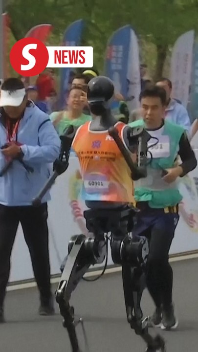 China pits humanoid robots against humans in half-marathon