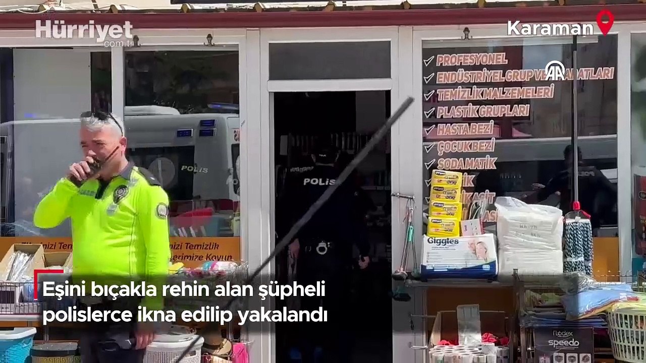 Eşini bıçakla rehin alan şüpheli polislerce ikna edilip yakalandı