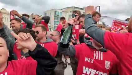 Newquay AFC players celebarted with fans during gthe day