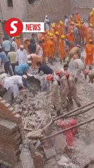 At least 11 killed in India building collapse