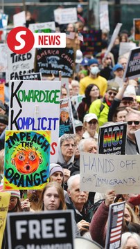 Thousands of protesters rally against Trump across US