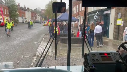 The open-top bus leaves Castle Street for Farnham Town FC's Memorial Ground.
