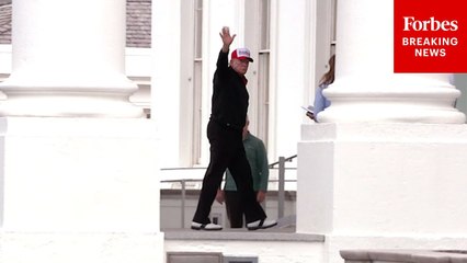 President Trump Waves To The Cameras Upon Return To The White House
