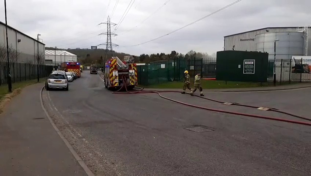 Watch as dozens of firefighters continue to tackle large morning blaze at waste recycling plant in Washington