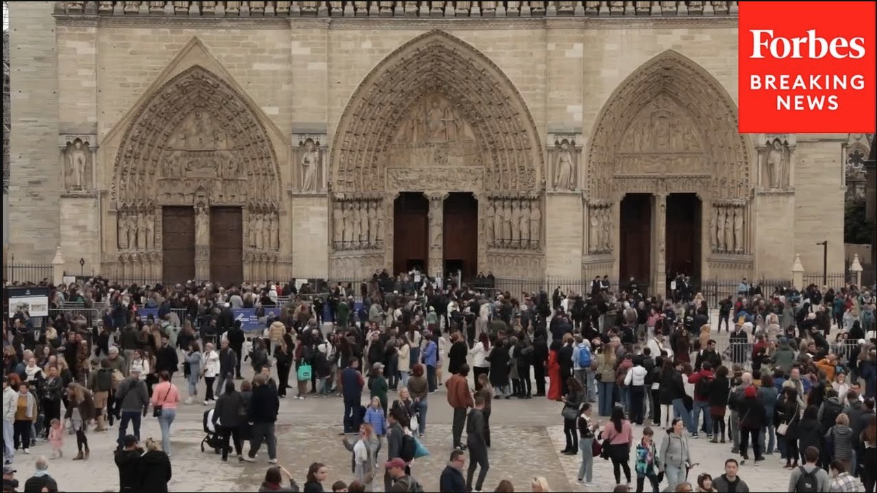 People Gather Outside Notre Dame Cathedral In Paris To Mourn, Pray After Death Of Pope Francis