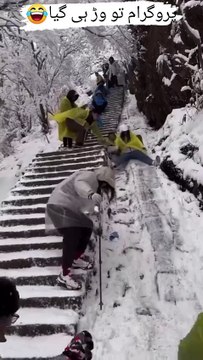 Slippery Slope! Man Slides Down Icy Hillside