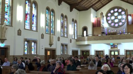 Australian Catholics attend special mass services to mourn Pope