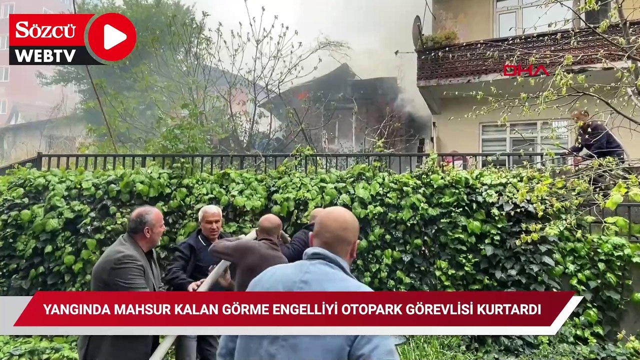 Yangında mahsur kalan görme engellinin yardımına otopark görevlisi koştu
