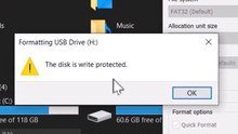 How can I remove write protection from a USB flash drive