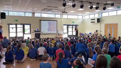 Zack 'Steel' George doing a walking handstand at Landscore Primary School (Will Goddard, Crediton Courier)