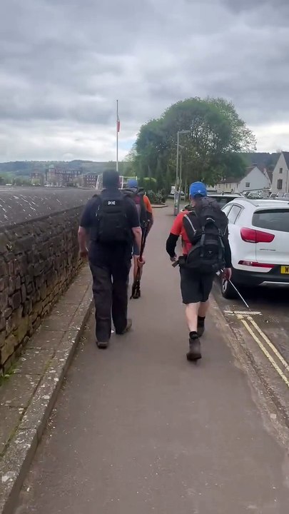 Rob Hickley on the last few yards of his South West Coast Path charity walk for the RNLI.