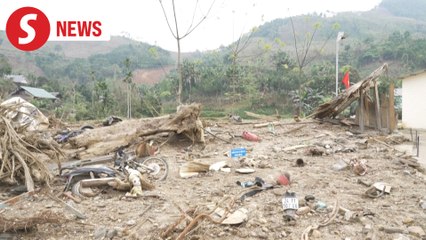 Vietnam village starts over with climate defences after landslide