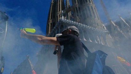 Protesters fire water pistols at tourist bus at Barcelona's Sagrada Familia