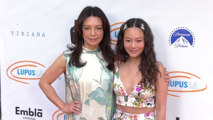 Ming-Na Wen and Krista Marie Yu on the orange carpet for Lupus LA's 2025 "Cuisine for a Cause" fundraiser
