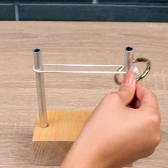 The ultimate ring and rope puzzle solution