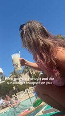 Girl Hilariously Falls and Spills Drink on Herself as Her Sun Lounger Collapses