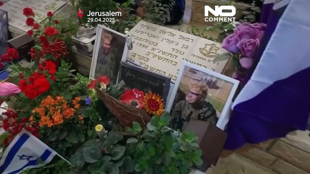 Grieving relatives visit military graves before Israel's Memorial Day