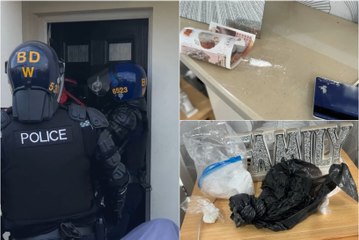 Watch moment police smash down door in Fleetwood drug raid as two people arrested