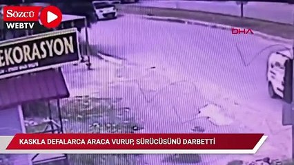 Kaskla defalarca araca vurup, sürücüsünü darbetti; o anlar kamerada
