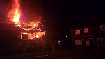 CCTV captures moment house exploded and burst into flames