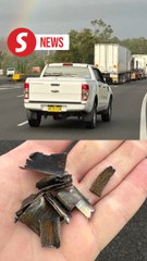 Hundreds of cars damaged after truck spills metal shards across Australian highway