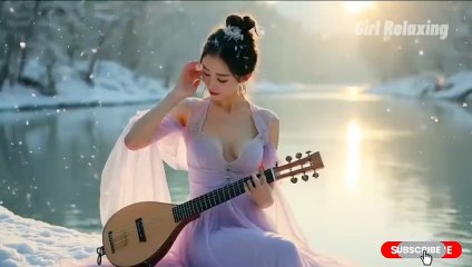 Guzheng Relaxing Music - Charming melody from beautiful Asian girl playing the piano by the cold snowy lake