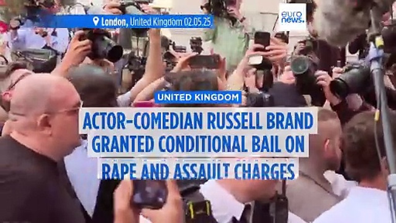 Russell Brand granted conditional bail after appearing in London court on rape and assault charges