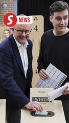 Australia's leaders cast votes in national election