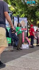 Long queues at polling booths as election day comes to a close for Australians