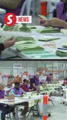 Count under way in Australia election with living costs, Trump in focus