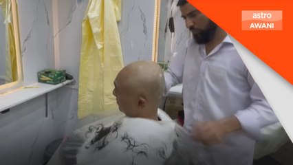 Wartawan sanggup botak, pengalaman bertahalul