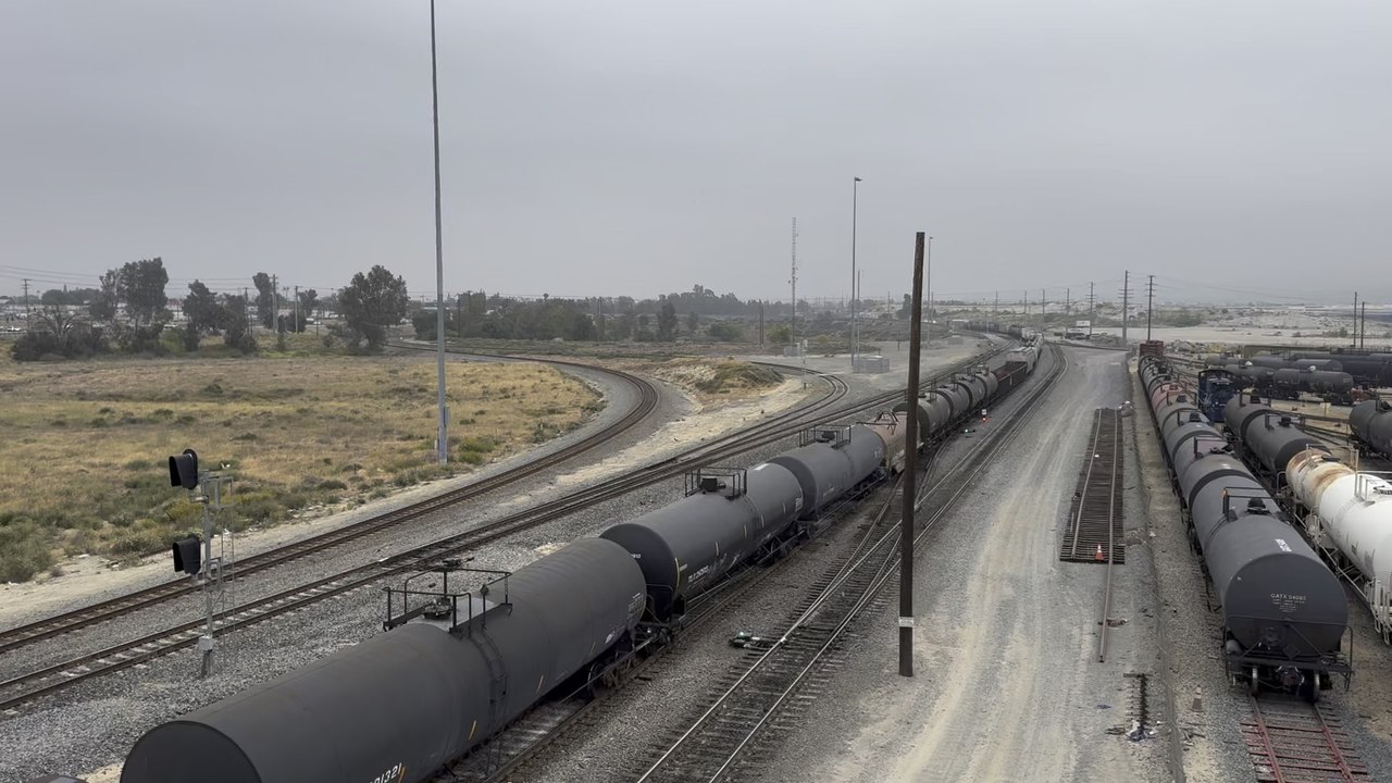 UP 7806 Westbound Intermodal Stack Meets UP 5848 Eastbound Manifest Train at West Colton Yard.