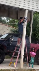 My little brother trying to make a swing for my little sister and I was taking a video of him and I didn't even notice her