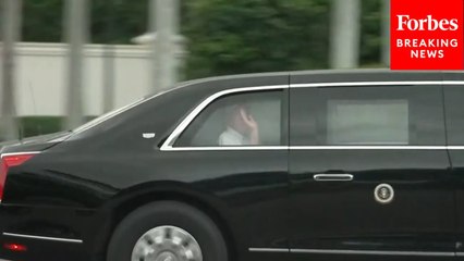 Trump Waves To Onlookers As He Departs Trump International Golf Club