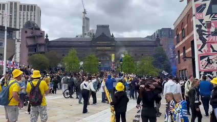 Leeds fans celebrate on City Museum steps