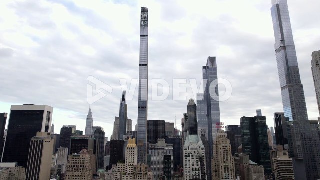Supertall skyscrapers in MIdtown, Manhattan, New York, USA - tilting Aerial view