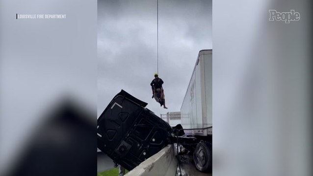 Truck Driver Rescued After Crash Leaves Him Dangling Off Bridge